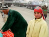 Girl and Father at Stop in Tajikistan